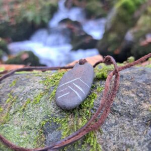 Colgante grabado neandertal